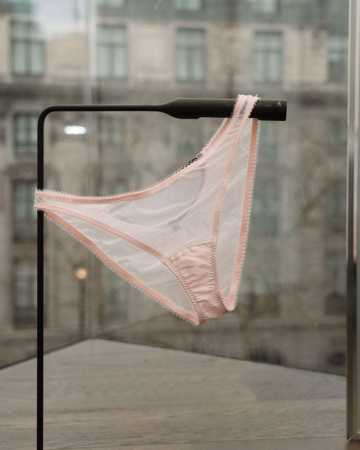 Vivi Leigh London Blush Pink Mesh Bra on top of design sketch